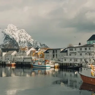 Fishing boats and harbor view from the molo in Henningsvær